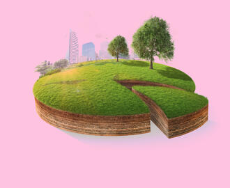 A pie chart resembling a piece of green land with a city skyline and trees 